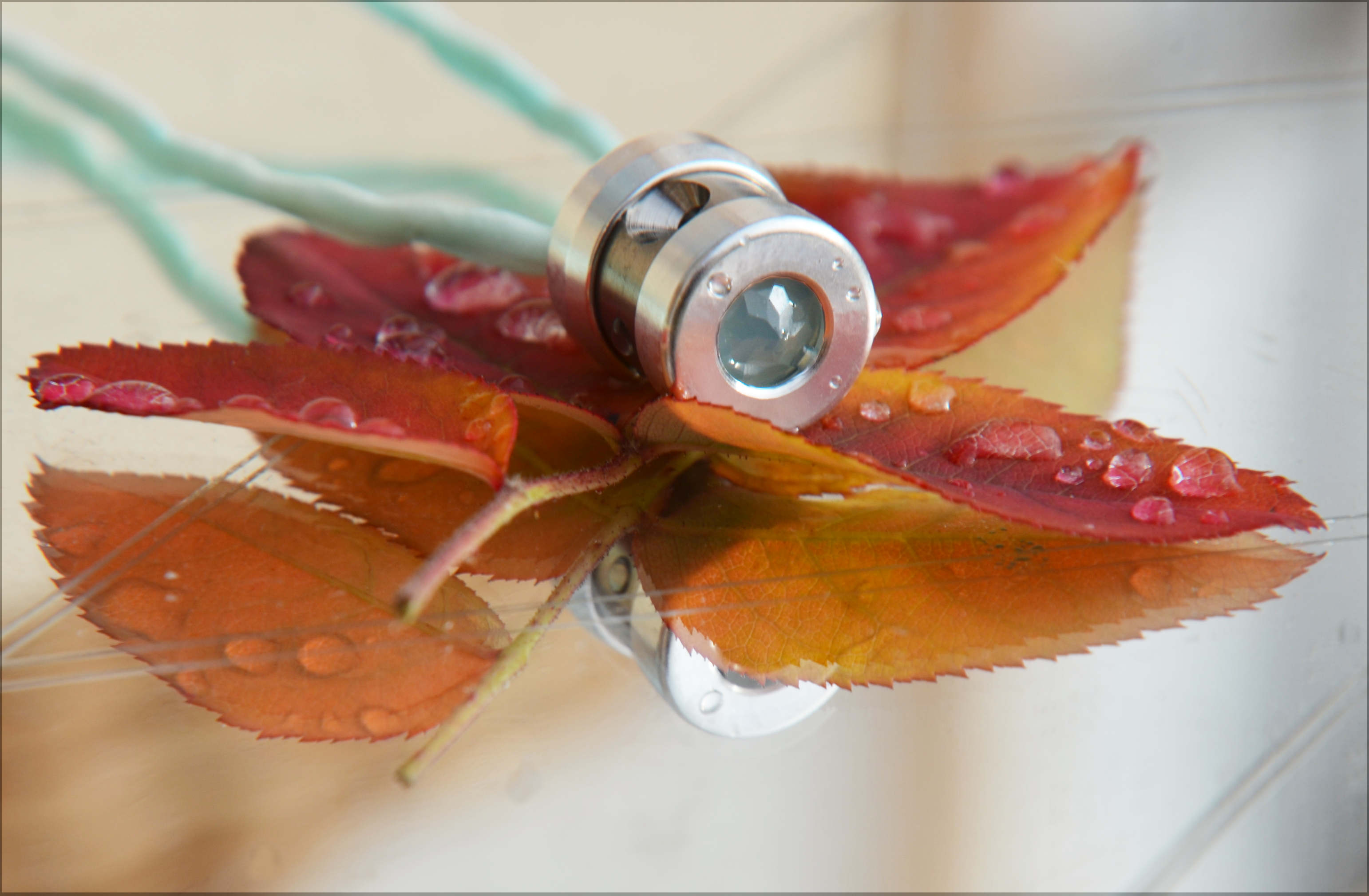 Herzkohärenz Kristallwirbel® Schmuckanhänger „Soul-Voice“ Titan | Bergkristall und blauer Chalcedon | ADV